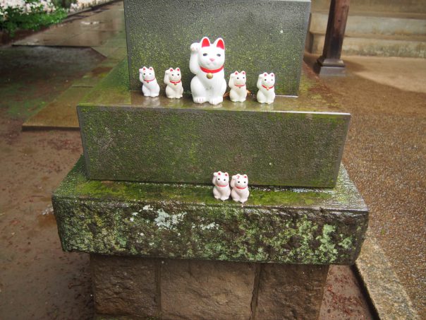 Cat Statues on Stone Lantern